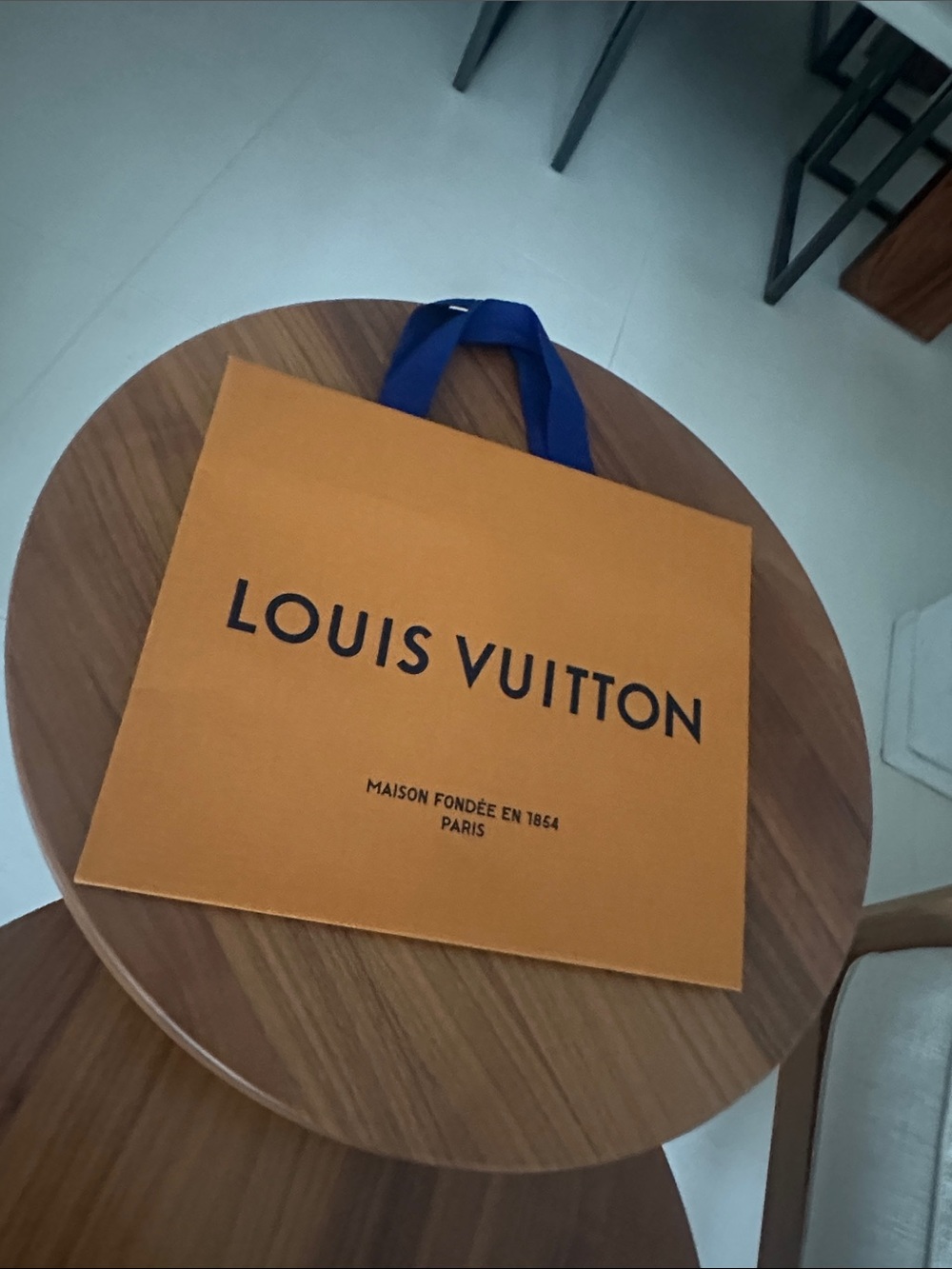 Authentic Louis Vuitton medium sized paper bag.